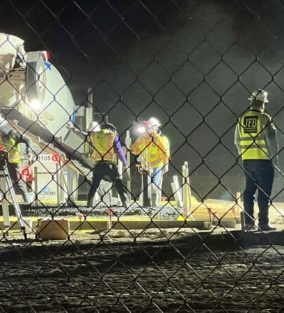 JFB workers at night on a construction site